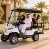 MXV 2+2 for Dubai Villa Communities Four adults riding a SUN-CART MXV 2+2 electric golf cart at a Dubai villa